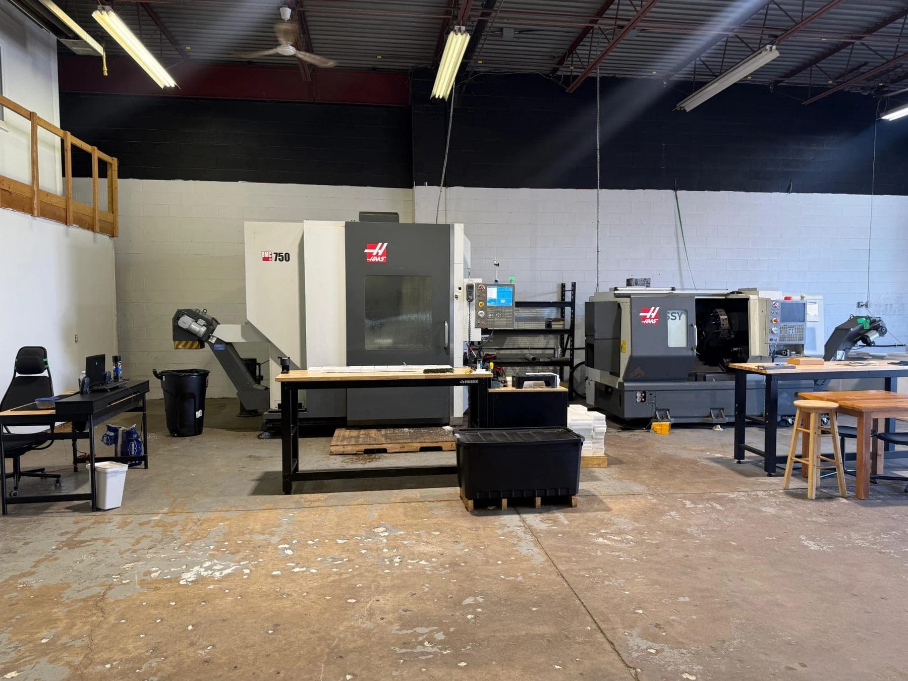 AGT Precision CNC machine shop floor in St. Catharines, Ontario with HAAS UMC-750 and HAAS ST SY lathe